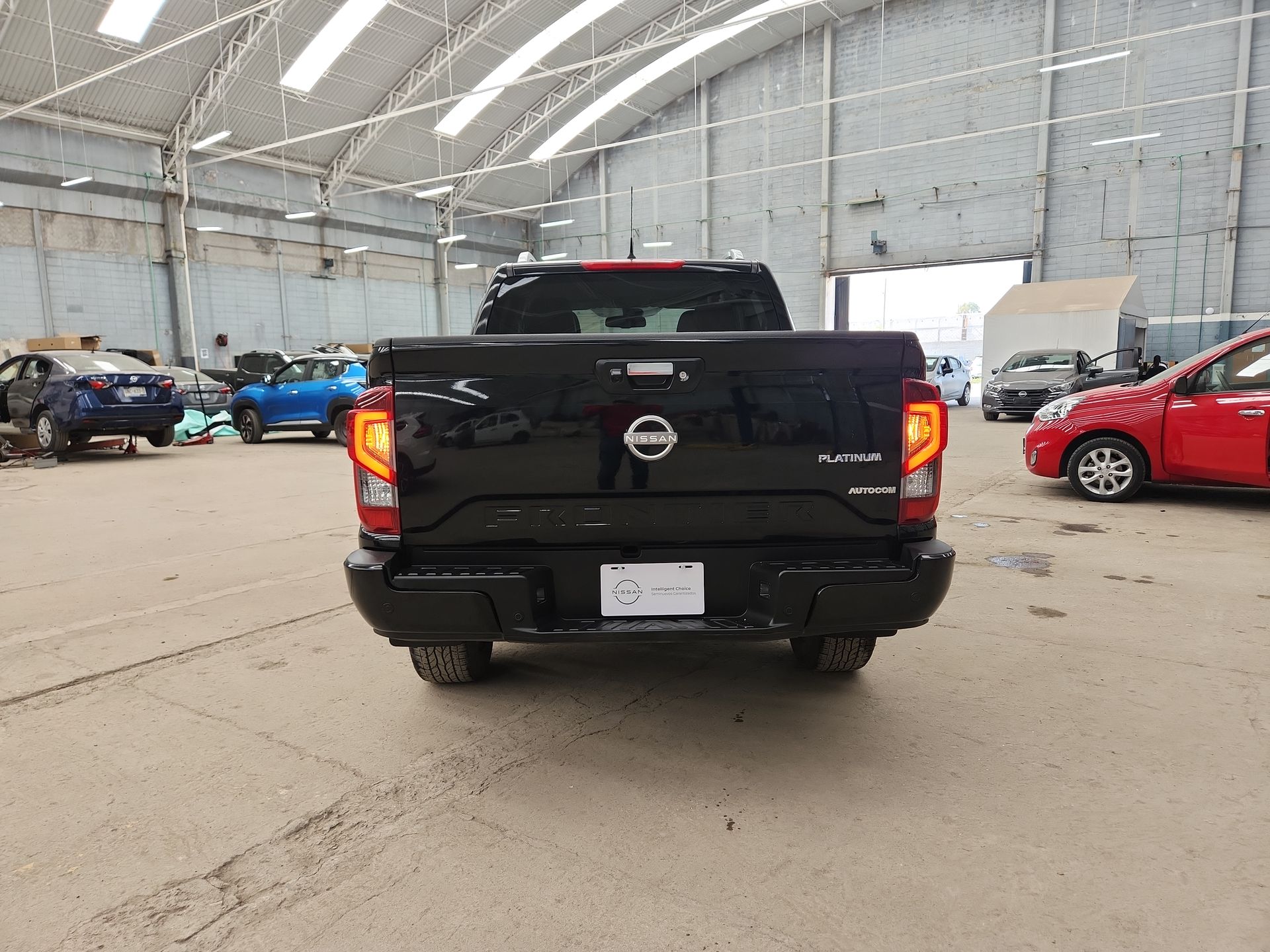 2023 Nissan FRONTIER PLATINUM LE TA 23